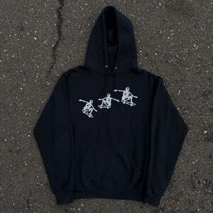 Bowery Supply Co Skateboarding Skeletons Black Graphic Hoodie